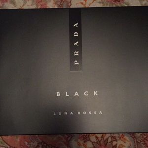 Prada Black travel pouch.